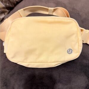 Lululemon yellow belt bag. Has marks, shown in photos.